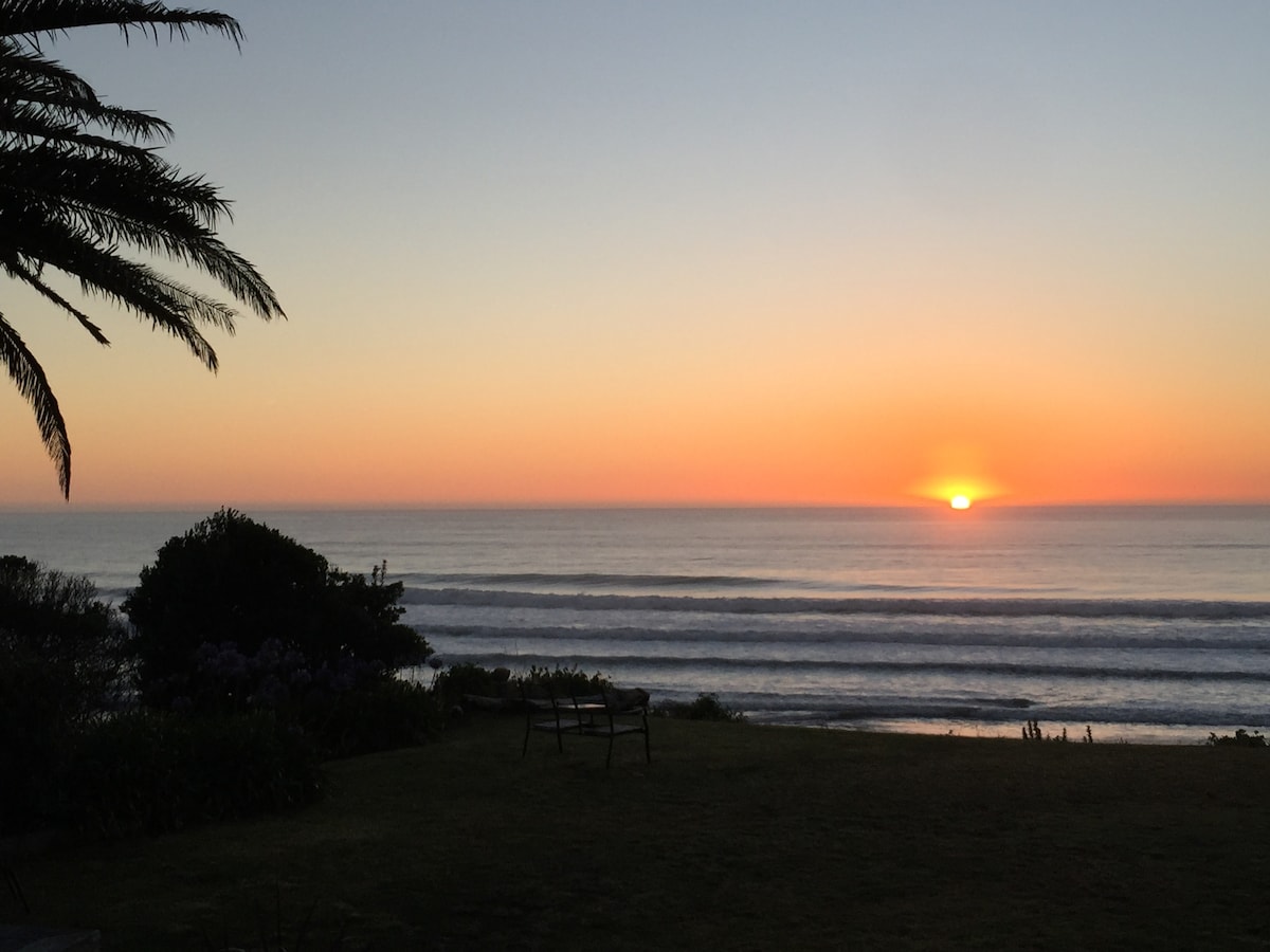 Sunrise over Wainui Beach